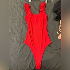 Vestique ruffle red bodysuit